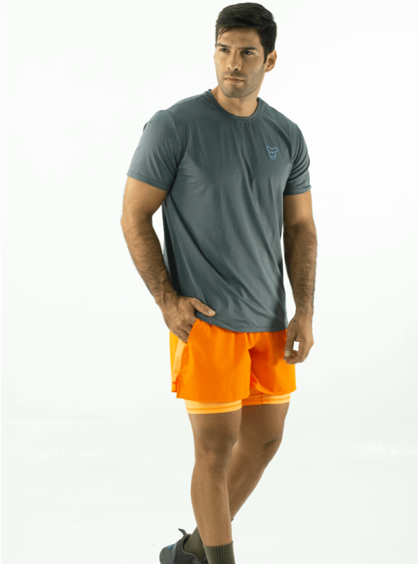 NORULES PANTALONETA RUNNING NARANJA