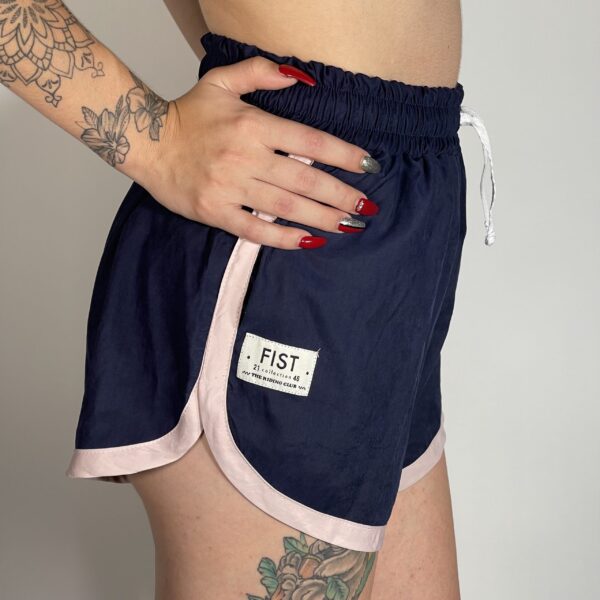 Fist short mujer